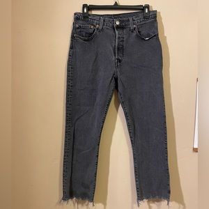 Black Levi’s with frayed ankle